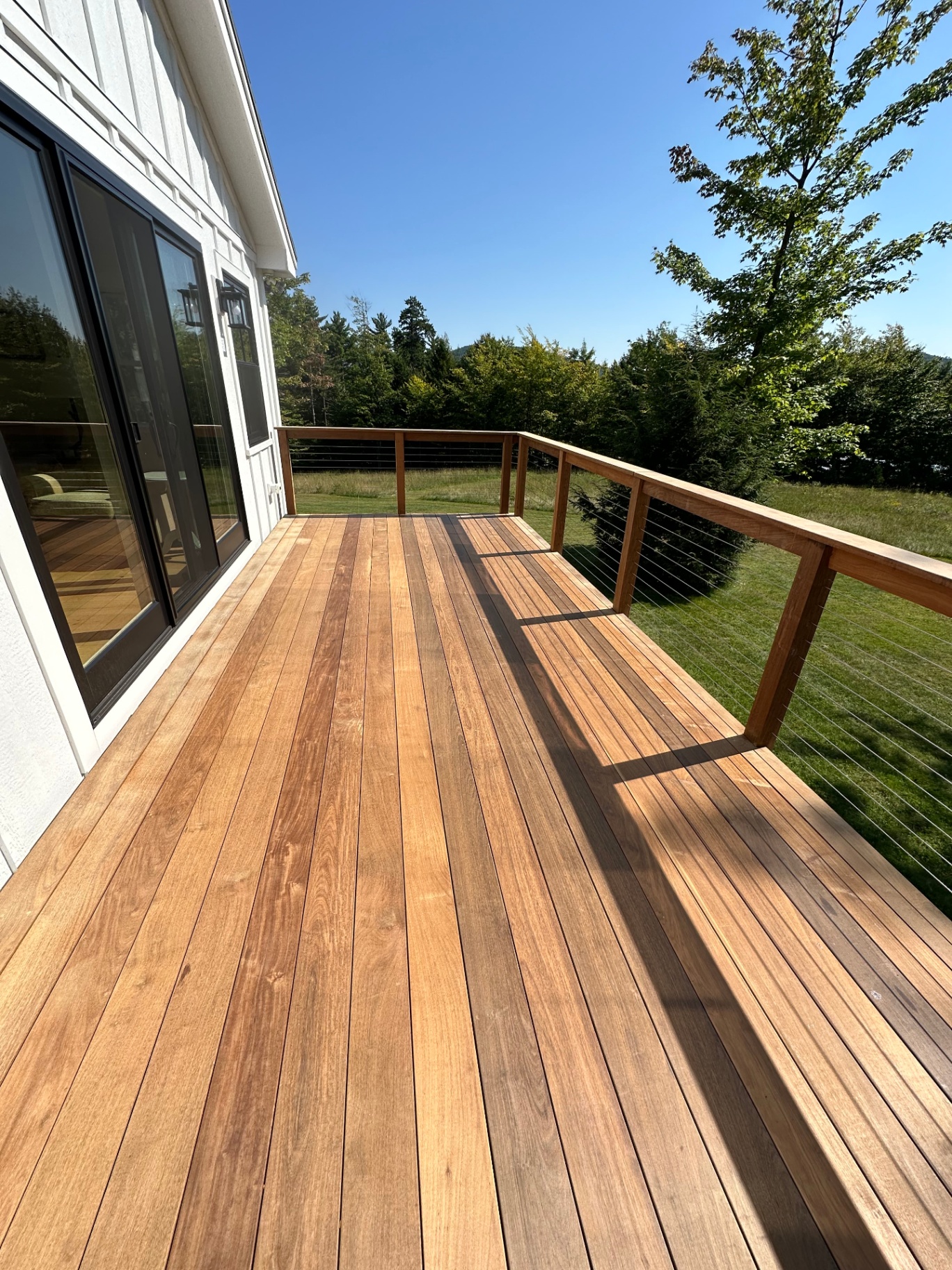 Custom Ipe hardwood deck construction in the Mount Washington Valley by Valley Builders