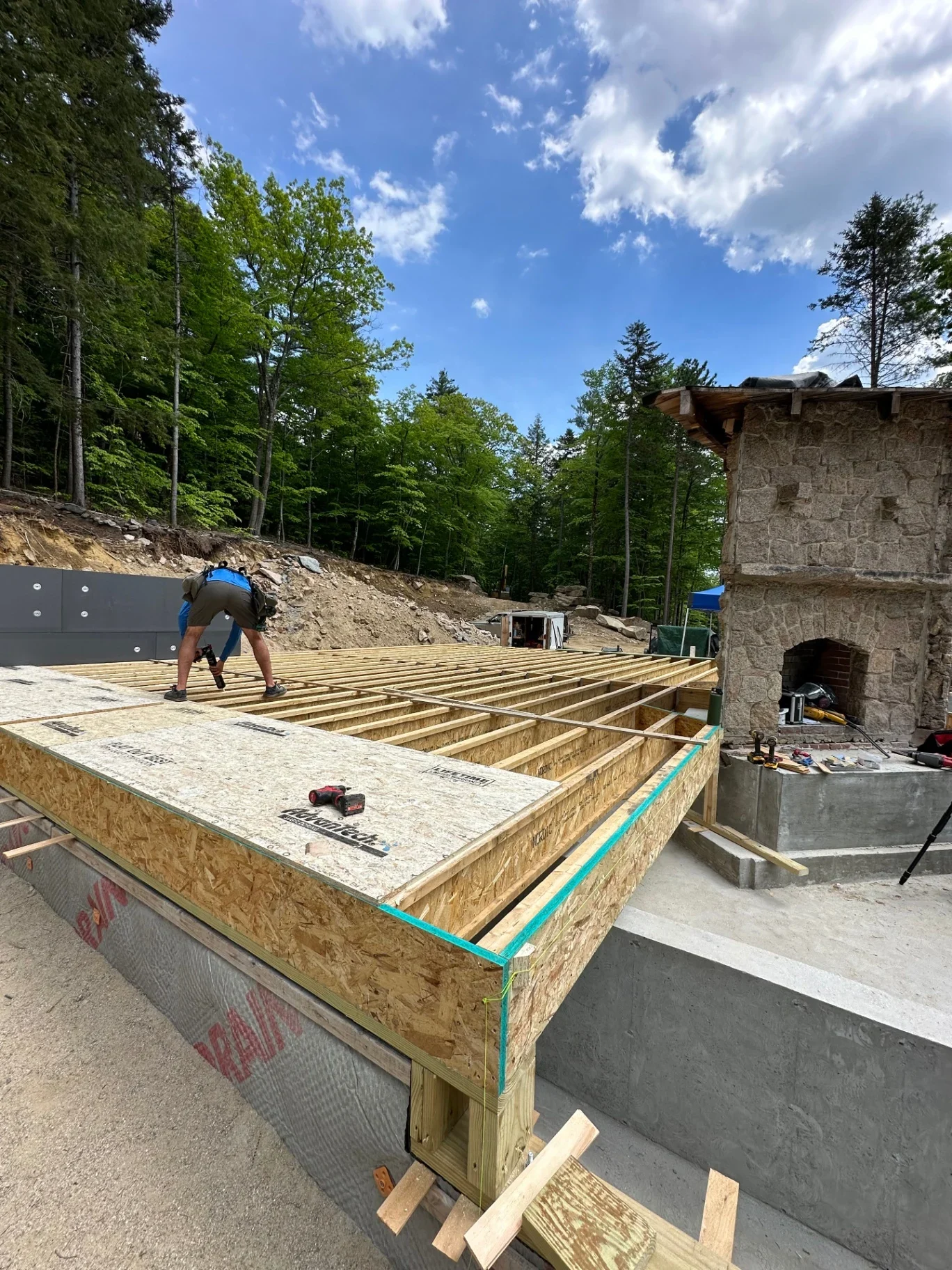 Floor framing and subfloor installation on custom home build Conway NH