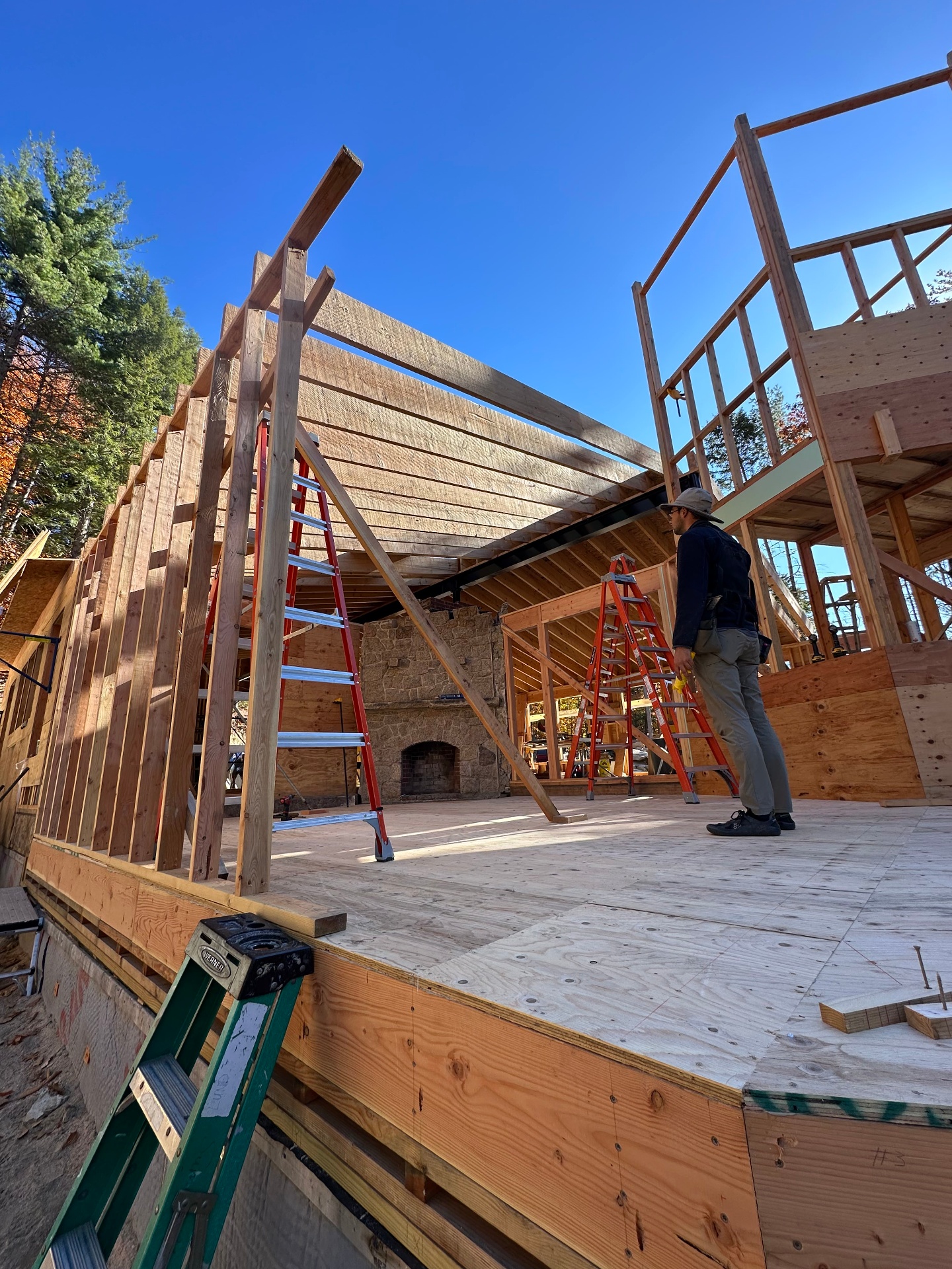 Wall framing and roof structure going up on White Mountains custom home build